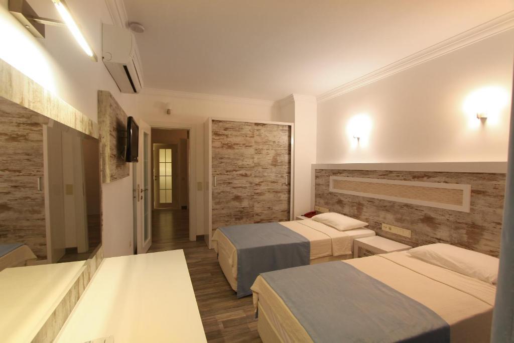 Nur Hotel Каш Номер фото