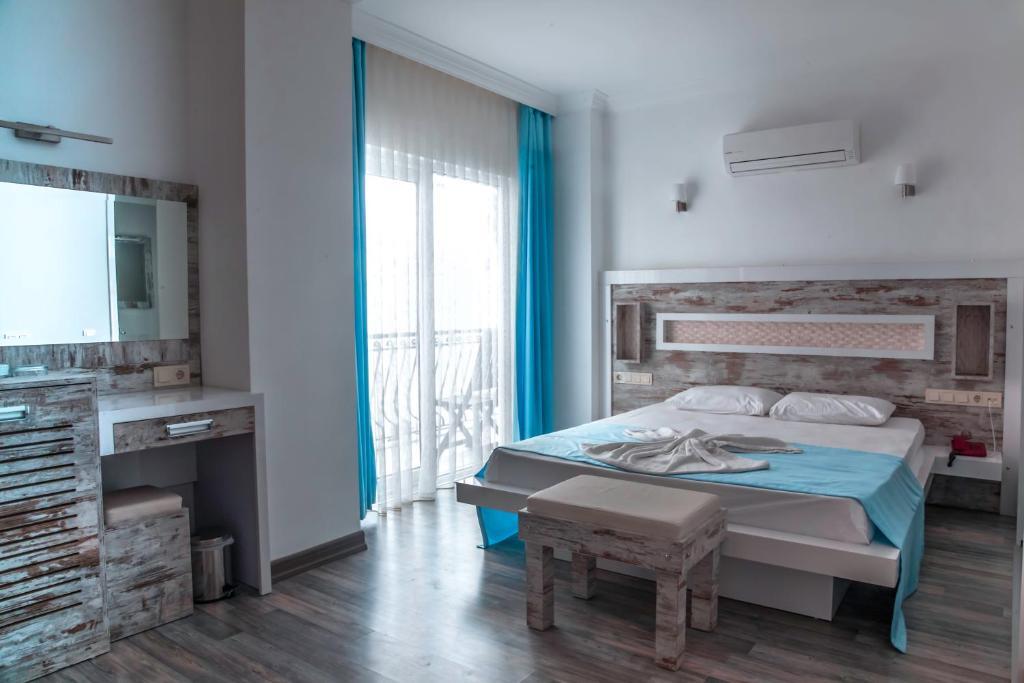 Nur Hotel Каш Номер фото